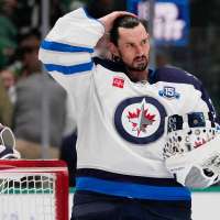 Jets suspend goalie Connor Hellebuyck for failing to report to training camp
