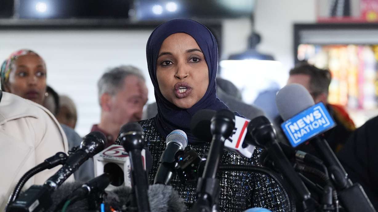 Rep. Ilhan Omar, D-Minn., speaks during a news conference on Jan. 28, in Minneapolis. The man who sprayed vinegar at her during a town meeting is expected to be sentenced on Thursday.