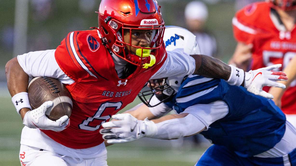 Springville’s Sioasi Toki (6) runs with the ball during a high school football game against Pleasant Grove at Pleasant Grove High School on Friday, Sept. 11, 2026.