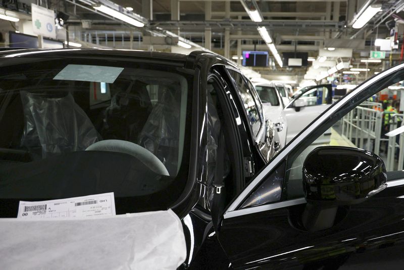 Volvo Cars' upcoming flagship car, the mid-sized Volvo electric SUV EX60, roll off the assembly line in Gothenburg, Sweden, April 22, 2026.