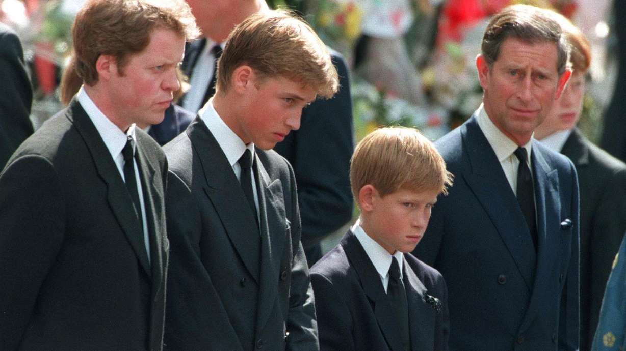 Princess Diana's sons, William and Harry, with their father Charles and uncle Charles Spencer outside Westminster Abbey on the day of their mother's funeral service, Sept. 6, 1997. The brother of the late Princess Diana has claimed in his forthcoming memoir that King Charles told him days after her death that "we'll forget her soon enough."