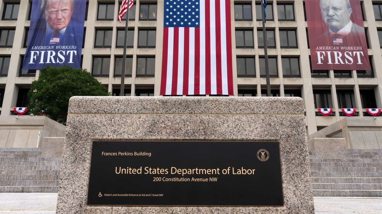 The number of people applying for unemployment benefits dropped sharply last week, another sign that layoffs remain rare and most Americans enjoy job security.