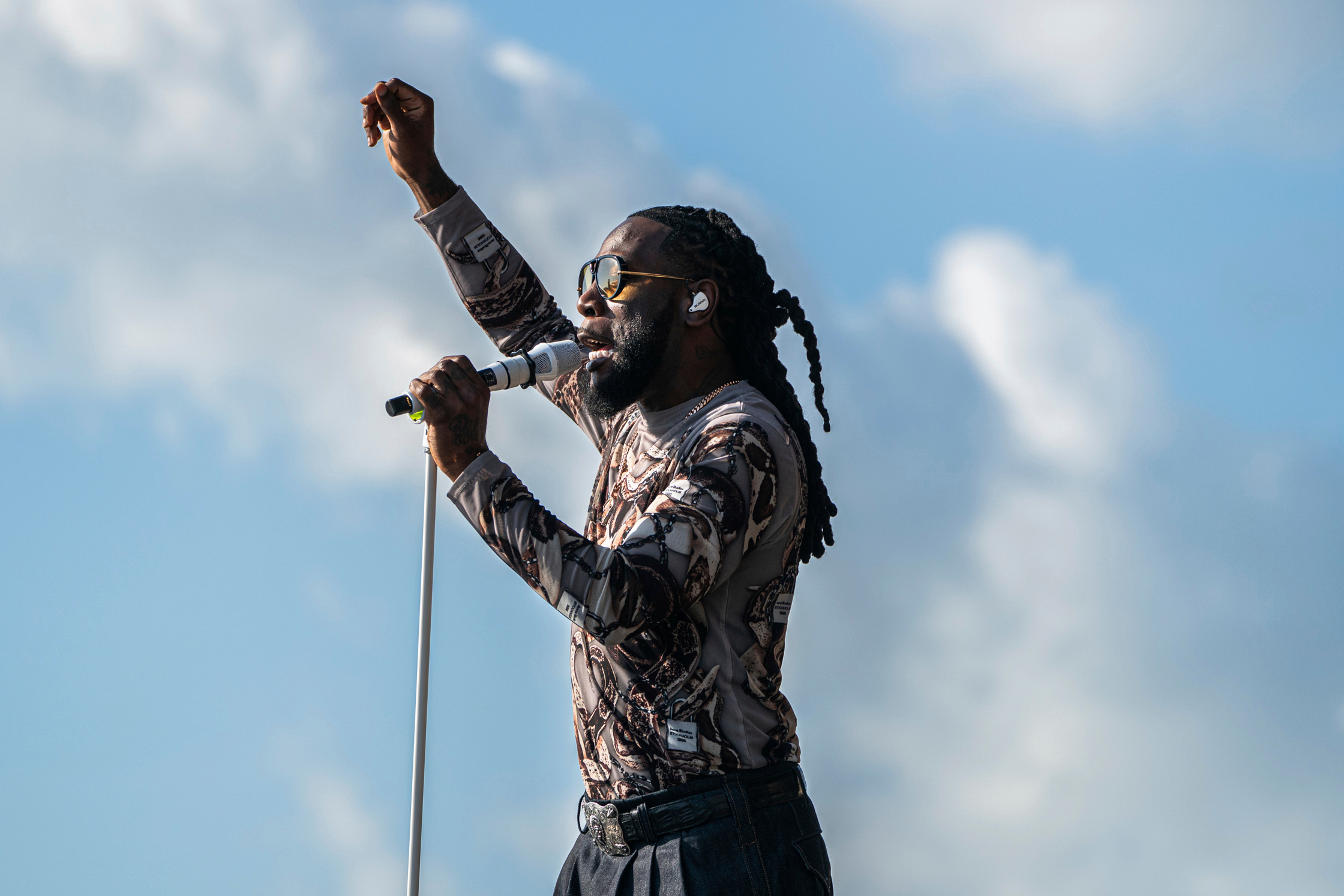 FILE - Burna Boy performs during the first weekend of the New Orleans Jazz & Heritage Festival on April 27, 2025, at Fair Grounds Race Course in New Orleans. 