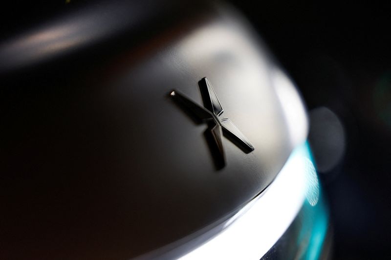 FILE PHOTO: A sign of Xpeng is seen on Xpeng's new flagship SUV GX, after a launch event for the car, in Beijing, China, May 20, 2026.