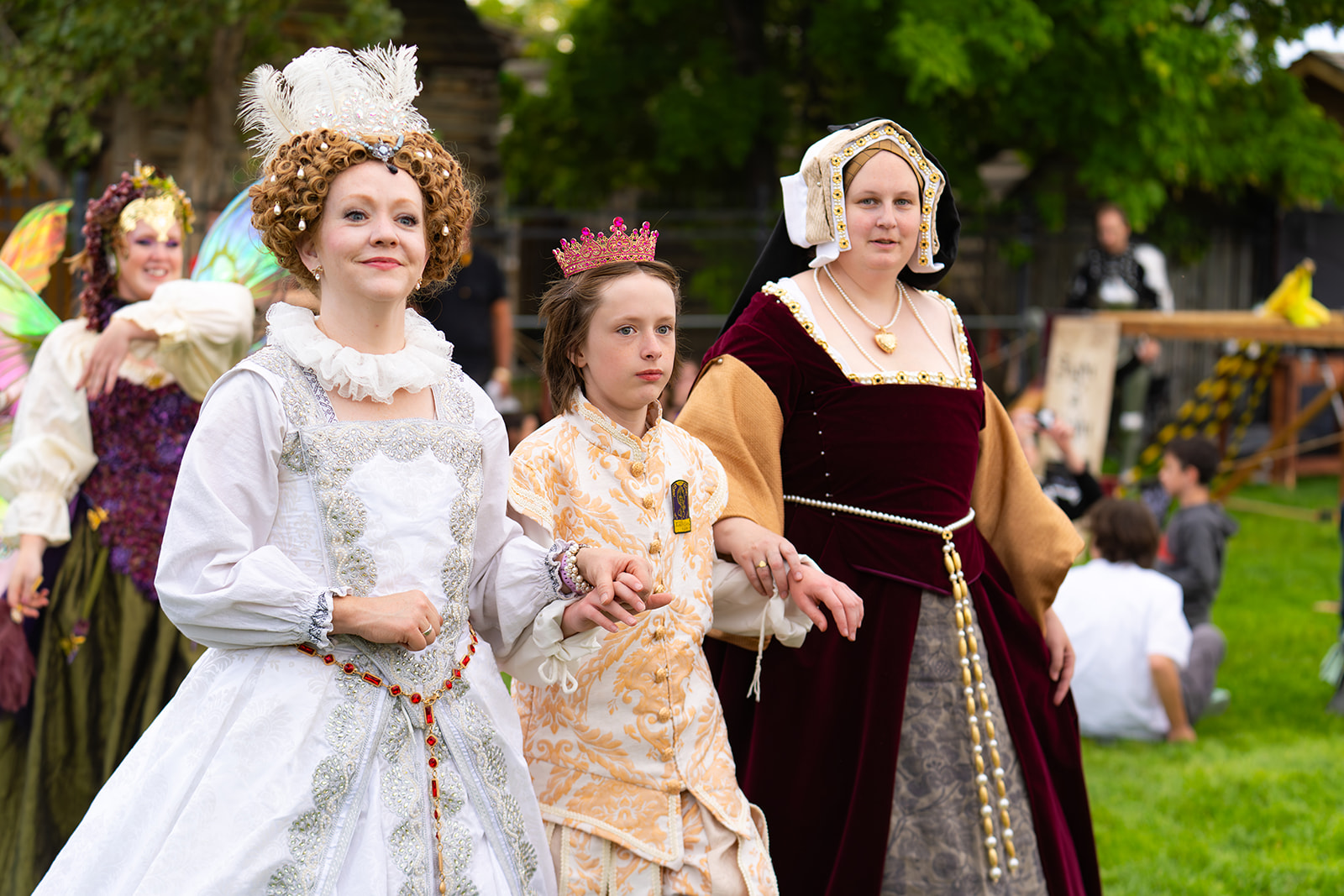 Performers dressed up as nobles from the House of Tudor parade around the grounds of the Tooele Renaissance Faire in September 2025.