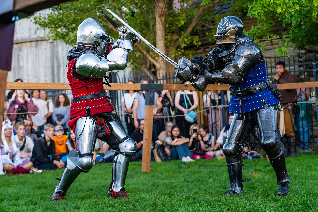 Two fighters duel before onlookers at the Tooele Renaissance Faire in September 2025.