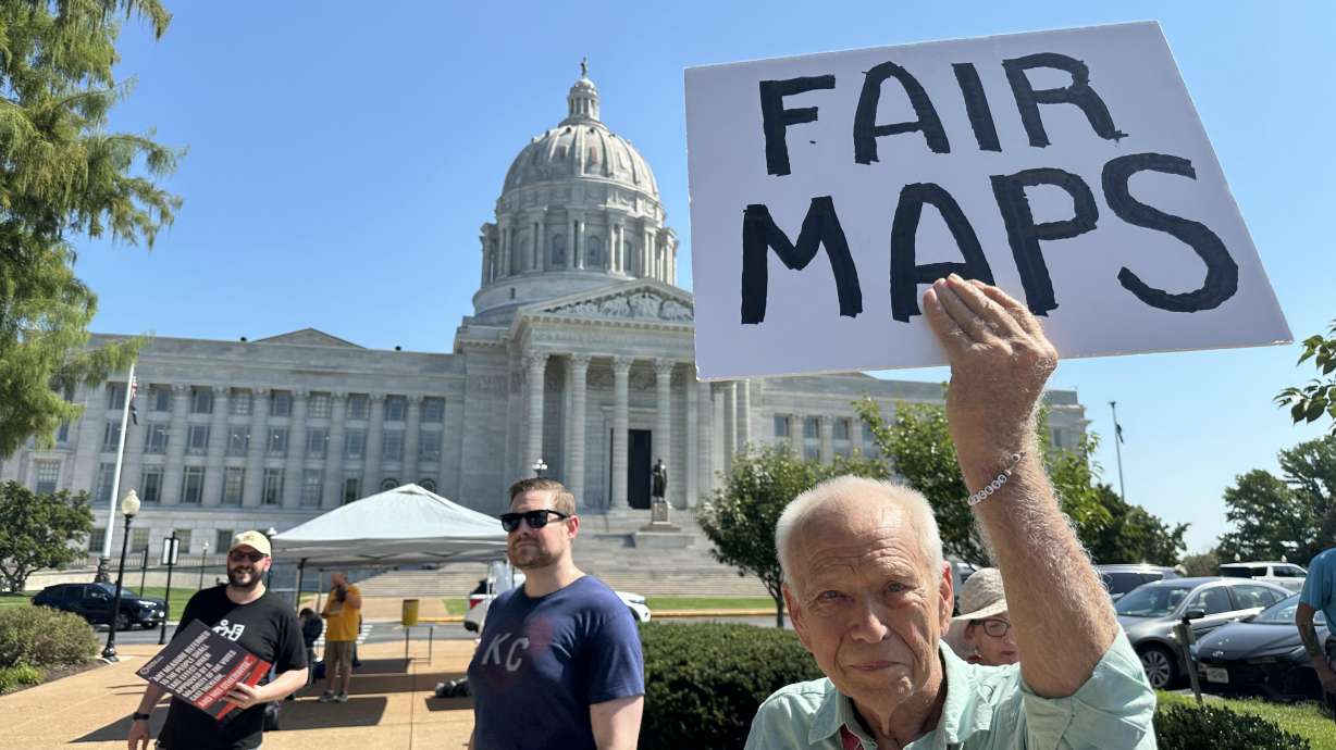 Steve Perry of Kansas City holding a sign in opposition to Missouri’s congressional redistricting plan on Sept. 2, outside the state Capitol, in Jefferson City, Mo. A federal appeals court on Thursday was weighing an attempt to resurrect the plan.