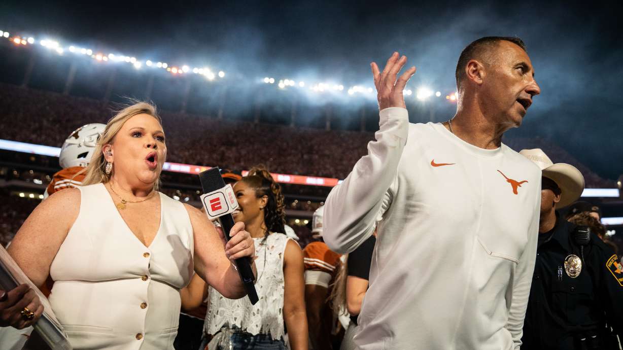 Texas Longhorns head coach Steve Sarkisian walks away from a post-game interview after it was delayed due to technical difficulties following Texas' 24-23 win over Ohio State during an NCAA college football game in Austin, Texas, Saturday, Sept. 12, 2026.