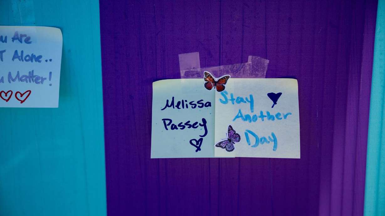 Notes are posted on a board before the Salt Lake City Out of the Darkness Community Walk, hosted by the American Foundation for Suicide Prevention Utah Chapter in West Jordan on Sept. 5.