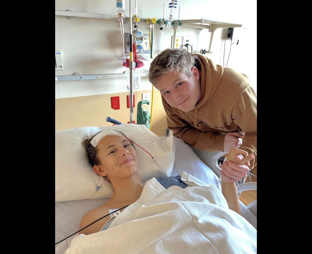 Alex Perry, 22, has terminal brain cancer. She said she is 'Lifting the odds' by running marathons, lifting weights and going to nursing school.
She ran her first marathon while on radiation and chemotherapy and will be running the St. George Marathon next month.