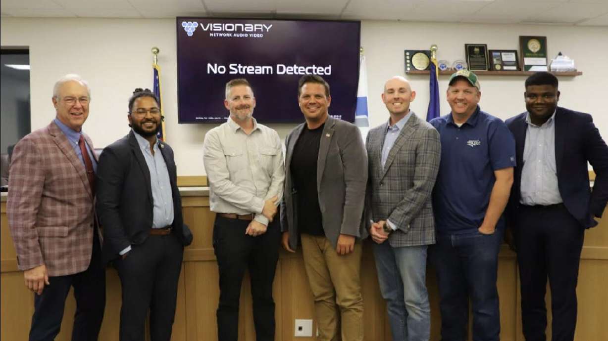 The Vineyard City Council on Sept. 15 with newest member Christopher "Chip" Price, third from left. He was chosen to fill the vacancy left by Ezra Nair, second from left, who resigned last month to work for Provo.