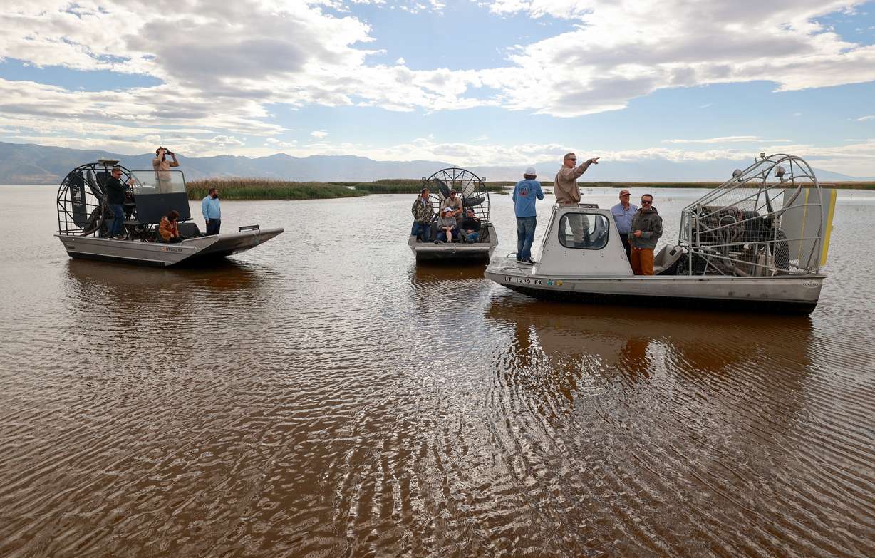 Utah state senators and other interested parties pause during an airboat ride through Farmington Bay on the eastern side of the Great Salt Lake on Thursday.