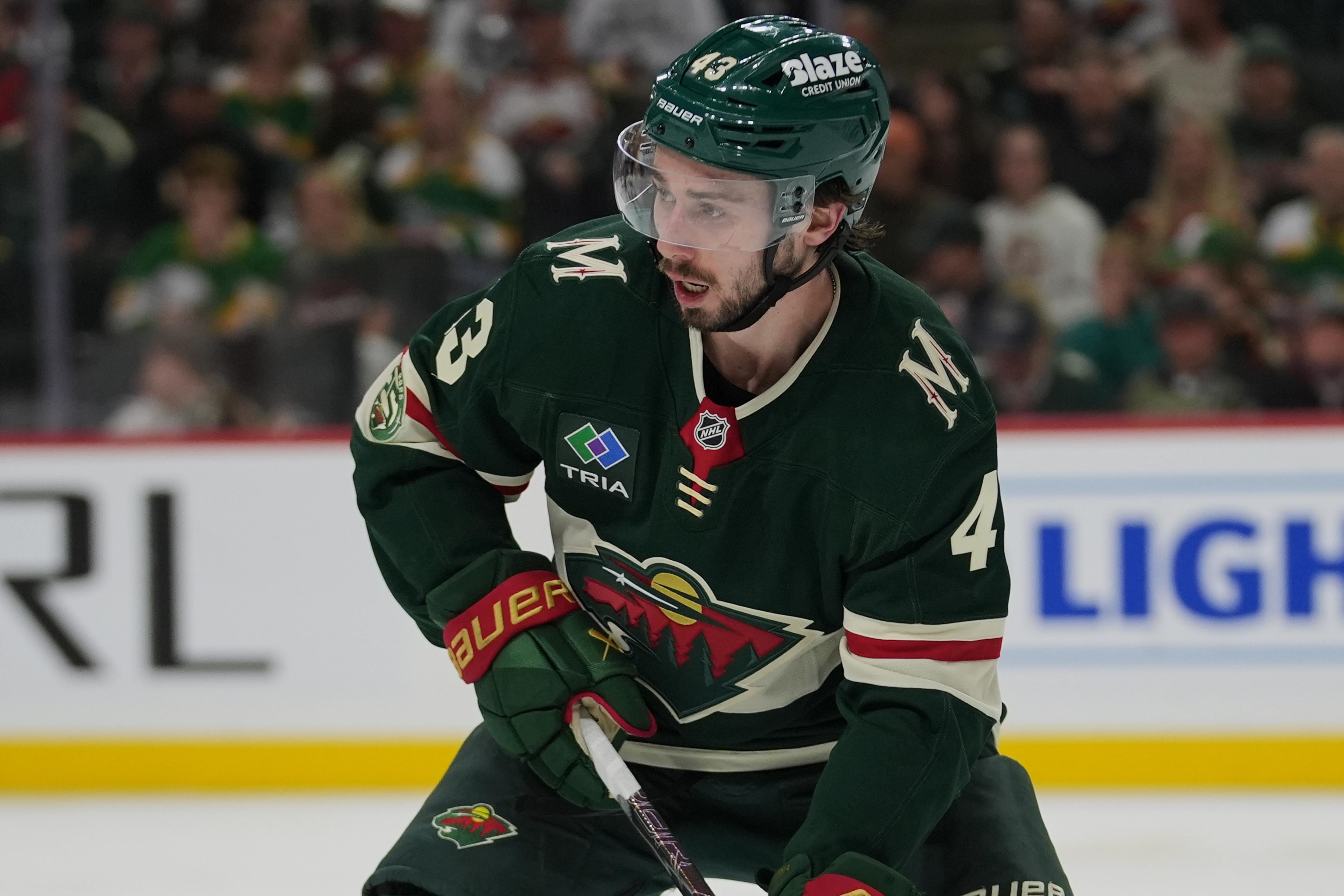 FILE - Minnesota Wild defenseman Quinn Hughes (43) skates with the puck during the second period of Game 3 of an NHL Stanley Cup hockey second-round playoff series against the Colorado Avalanche Saturday, May 9, 2026, in St. Paul, Minn. 
