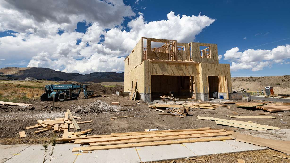 Materials are placed for when workers return to build a house in Herriman on Aug. 22. After mortgage rates brushed 7% this past week, people are nervously asking how much more they may rise after the Federal Reserve raised interest rates.