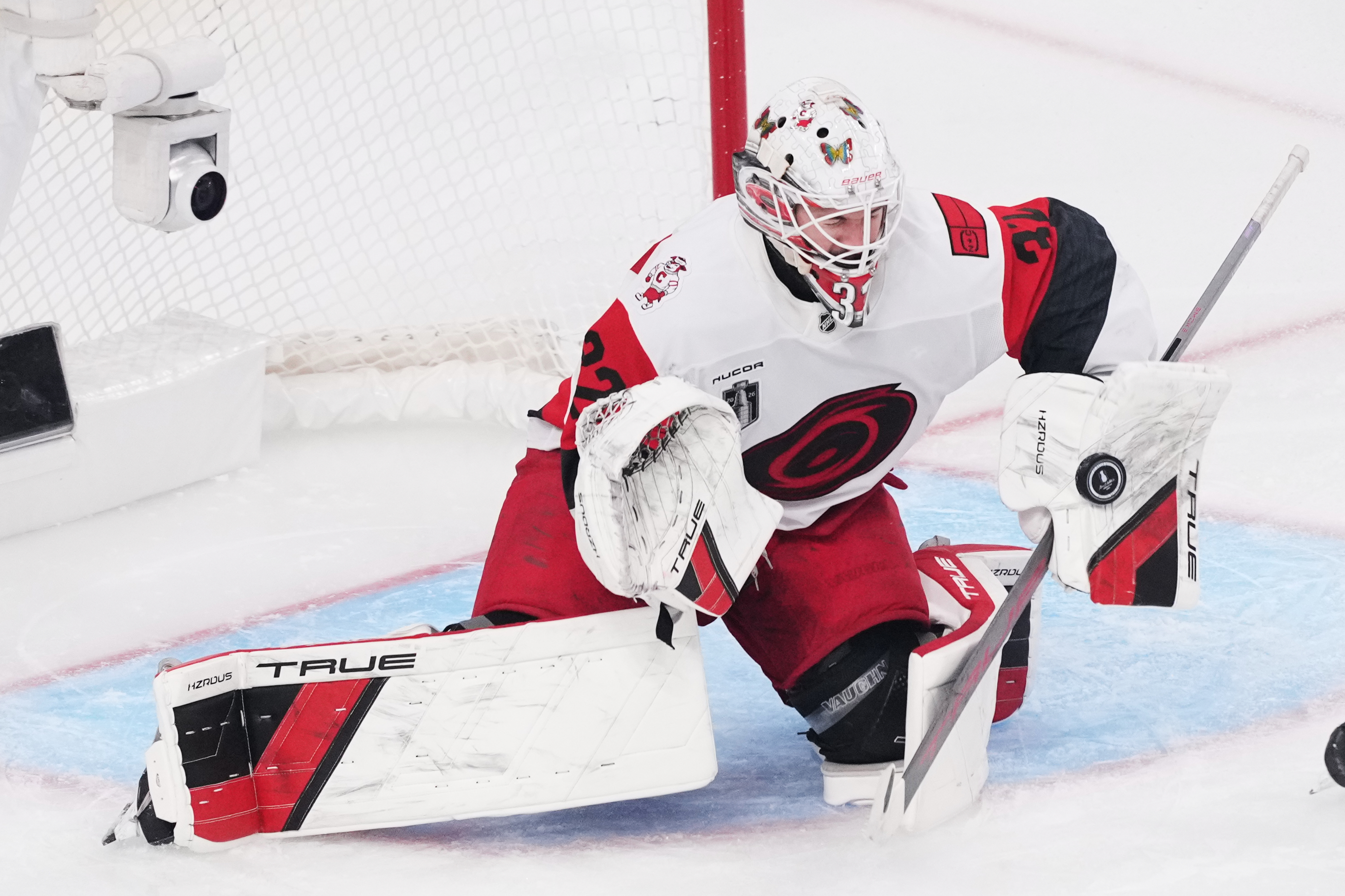FILE - Carolina Hurricanes goaltender Brandon Bussi (32) stops a shot on goal during the second period in Game 6 of the NHL hockey Stanley Cup Final series against the Vegas Golden Knights, Sunday, June 14, 2026, in Las Vegas. 
