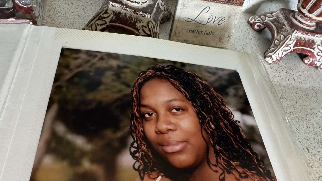 Sheree Allen is pictured inside her mother's home. Police on Thursday said they had reached a resolution in a 2005 cold case homicide and pointed to a longtime suspect who died in 2013.