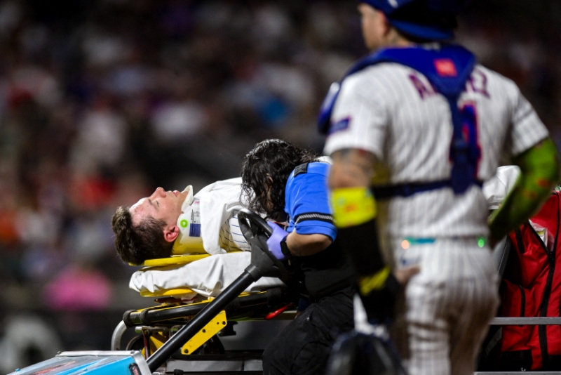Sep 17, 2026; New York City, New York, USA;  New York Mets first baseman Jared Young (29) receives medical attention after an injury at first base during the sixth inning against the Philadelphia Phillies at Citi Field.