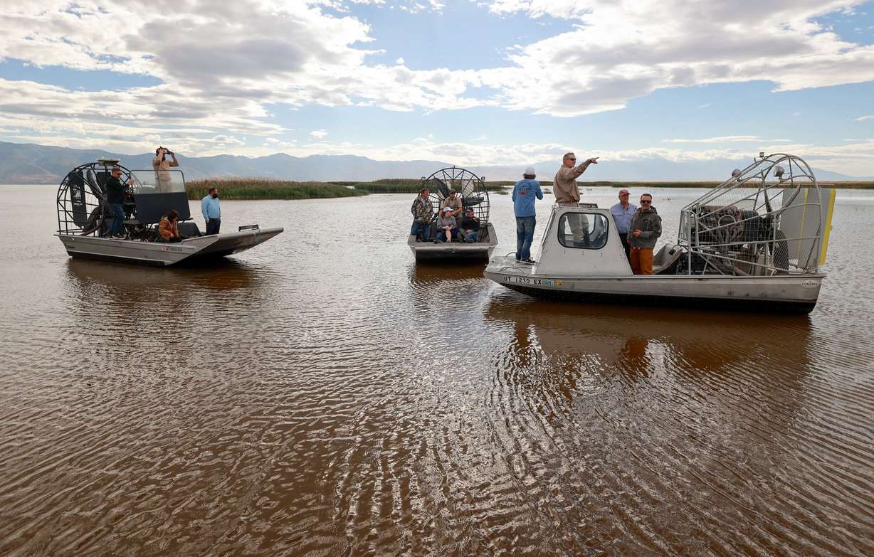 Utah state senators and other interested parties pause during an airboat ride through Farmington Bay on the eastern side of the Great Salt Lake on Thursday. Legislators are focusing on ideas to use the potential $1 billion to revive the lake from Congress.