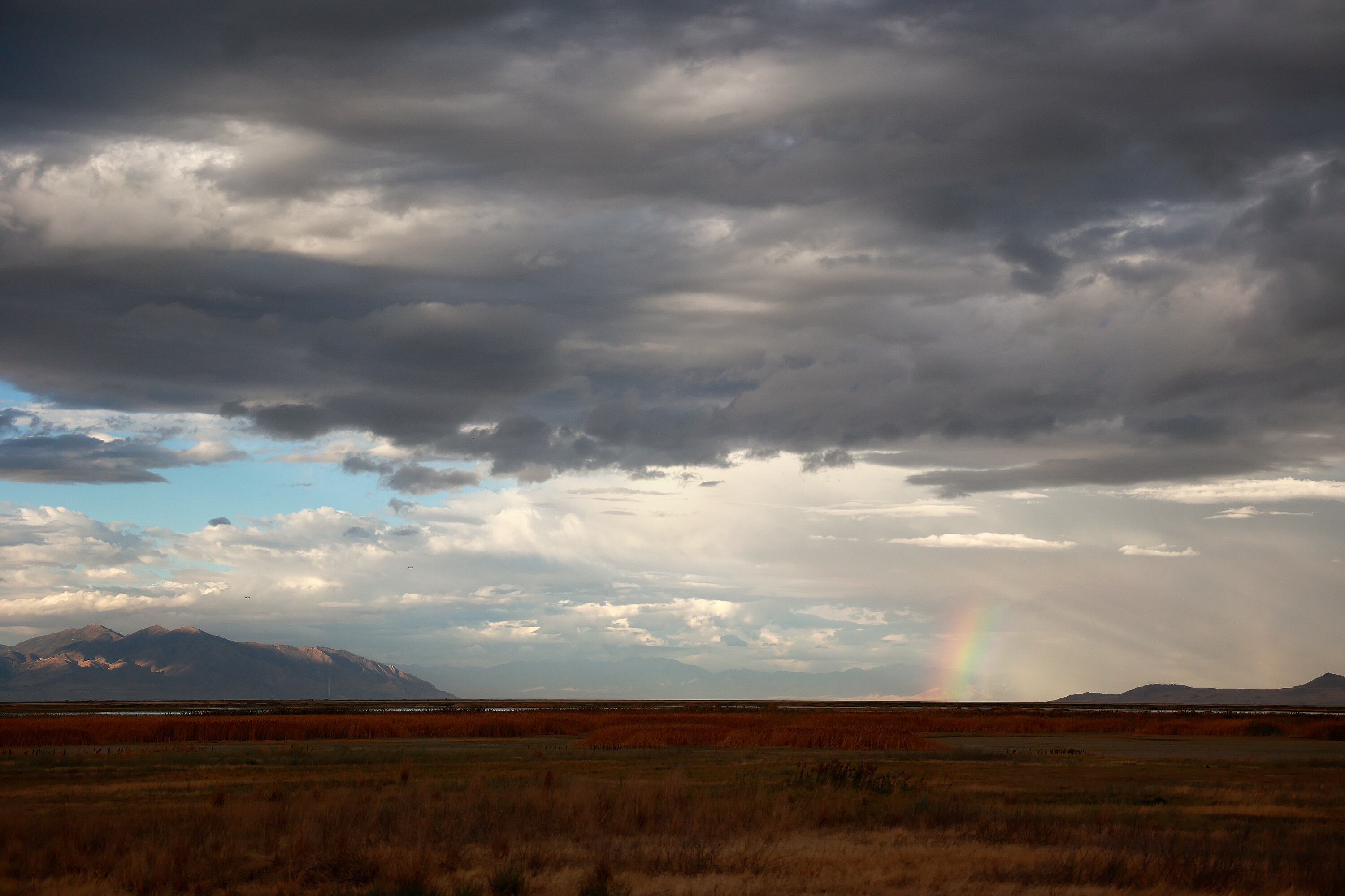 A rainbow over the Great Salt Lake is seen from the Eccles Wildlife Education Center in Farmington on Thursday. Lake Commissioner Hannah Freeze is looking at multiple conservation options.