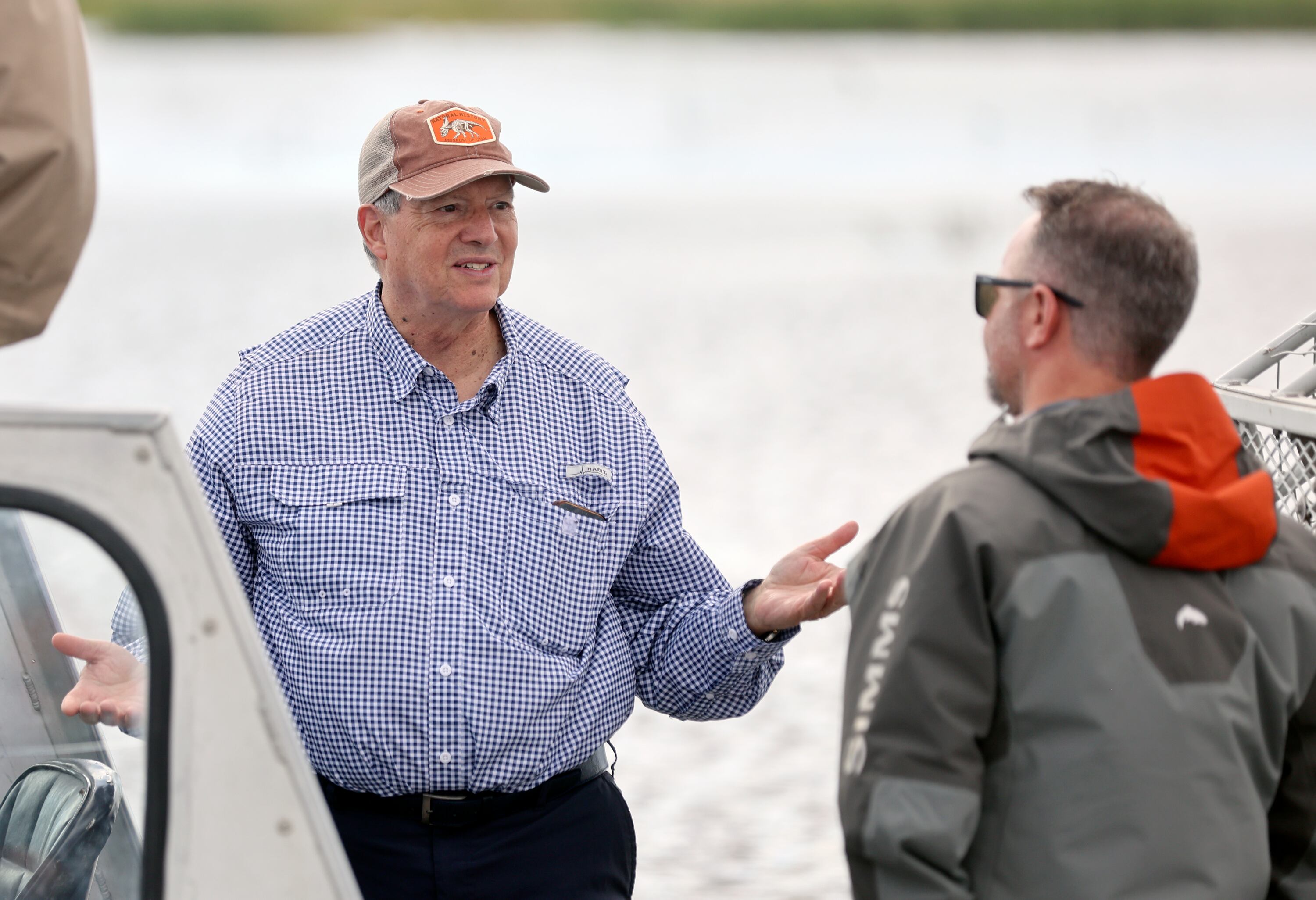 Sen. Wayne Harper, R-Taylorsville, talks with Jordan Nielson, Great Salt Lake Rising executive director, during an airboat ride through Farmington Bay on the eastern side of the Great Salt Lake on Thursday. Legislators are proposing ideas to save the lake through $1 billion in funding to be received from Congress.