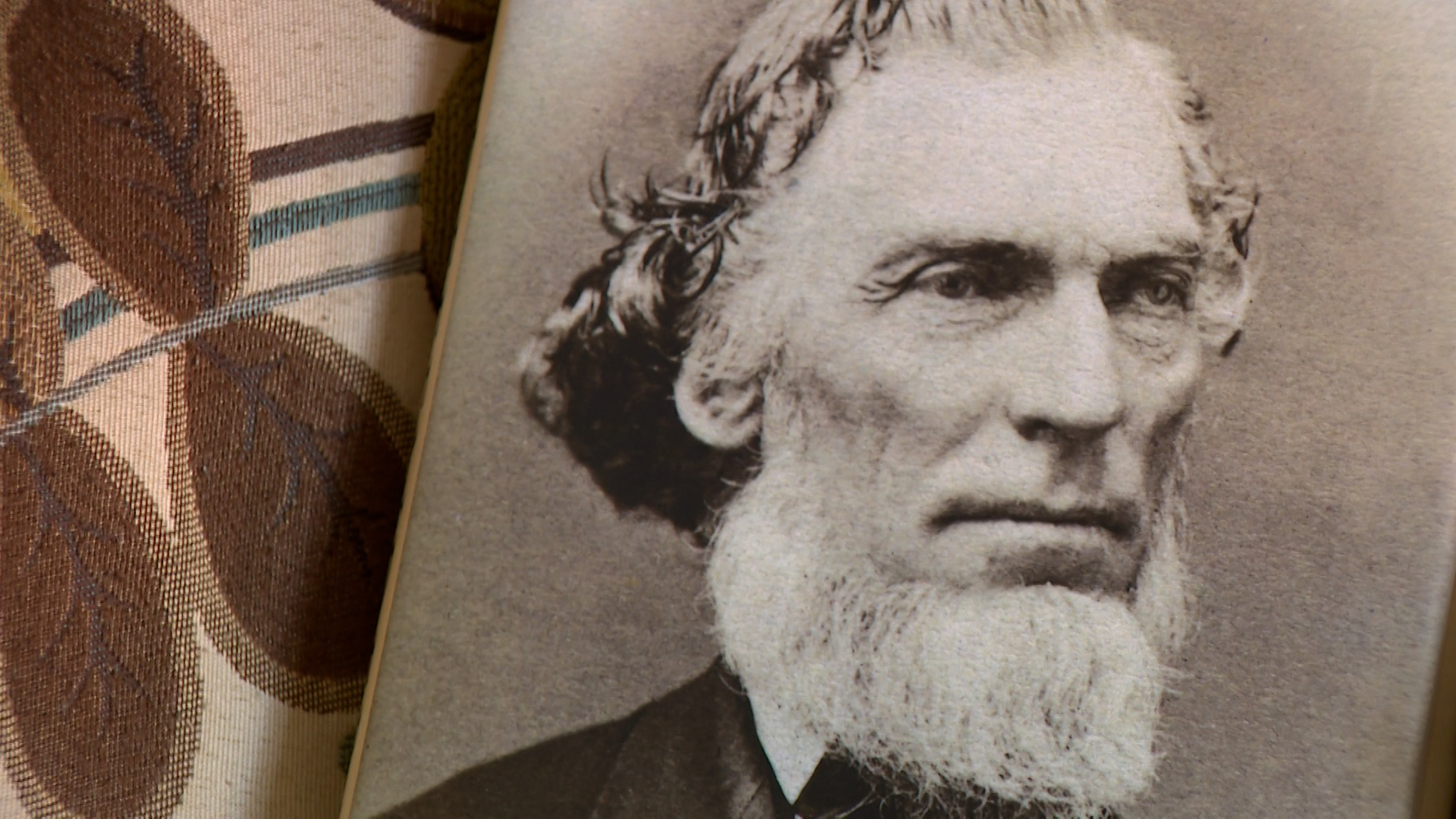 A photo of Daniel H. Wells on a book about him is pictured on Thursday.