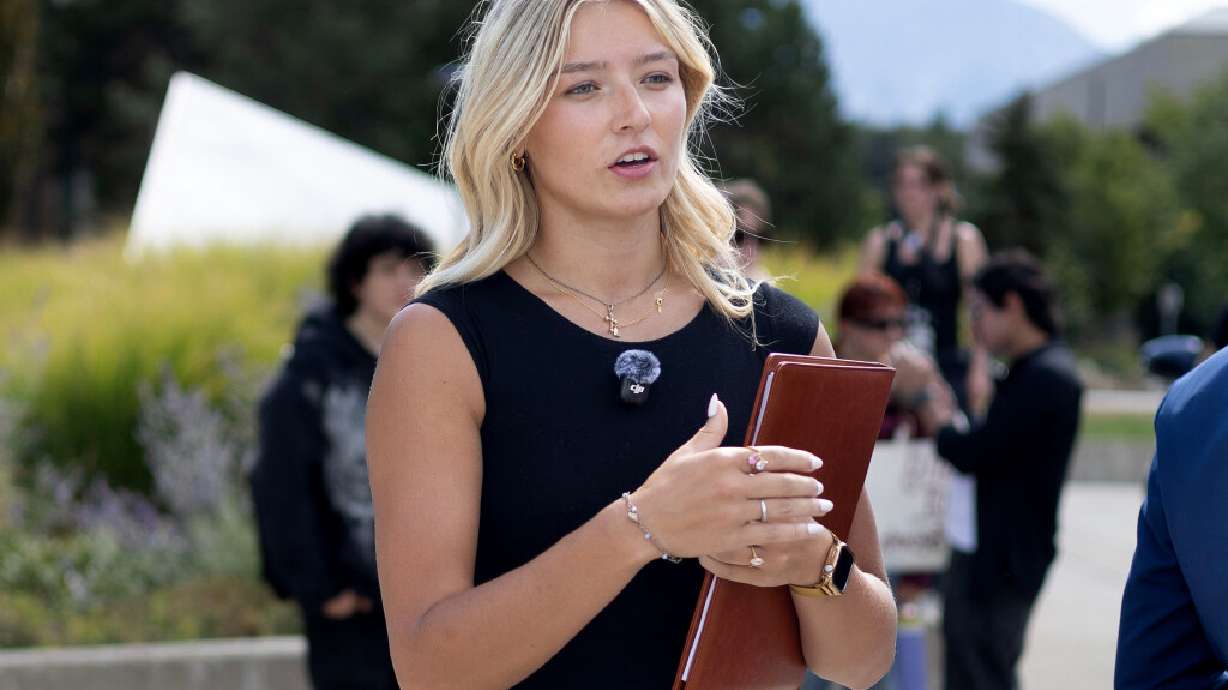 Rylie Barnes, vice president of the University of Utah College Republicans, speaks with students on the campus in Salt Lake City on Wednesday.