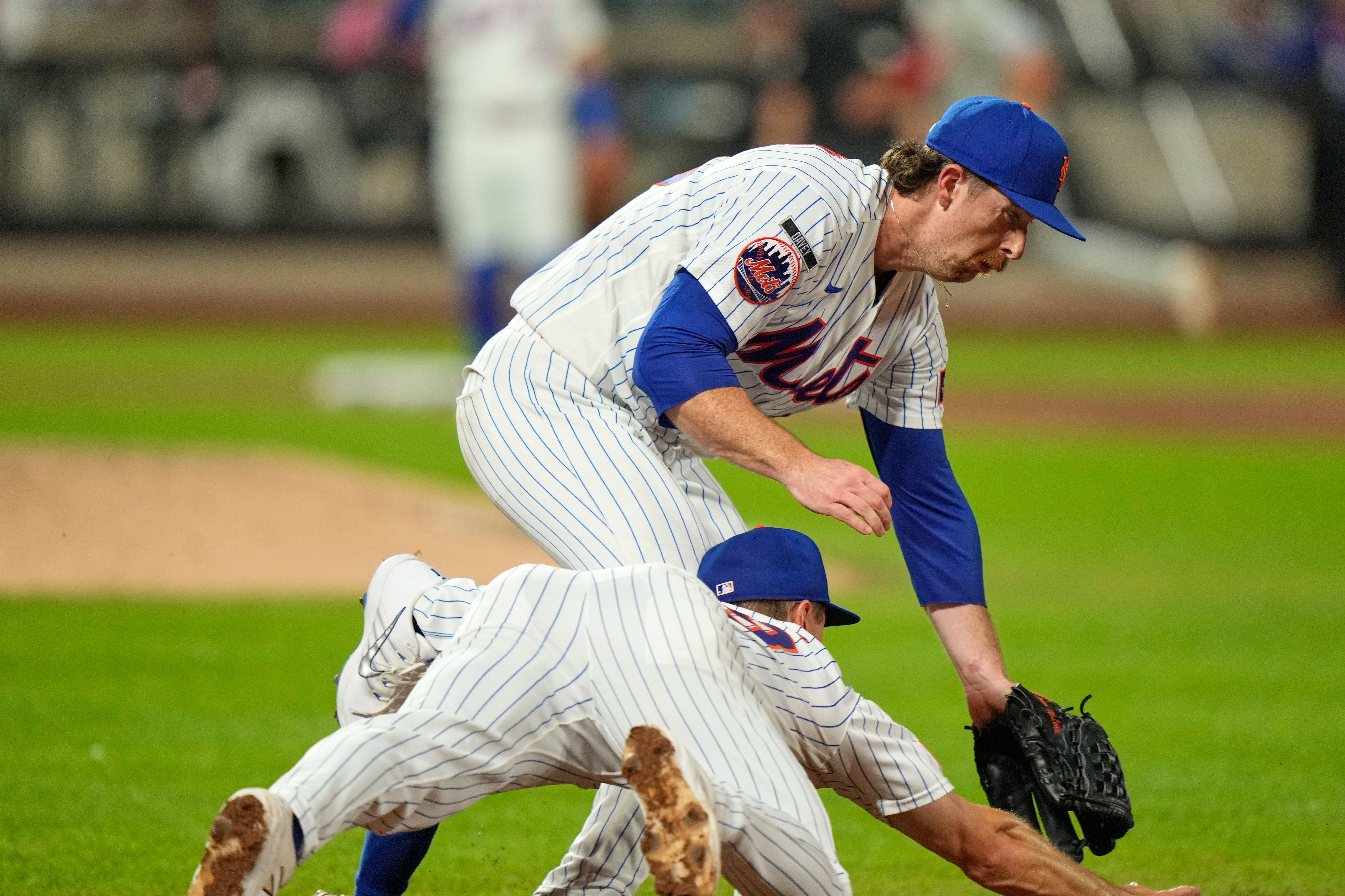 Mets' Jared Young has concussion symptoms, CT scan negative after scary collision with Nolan McLean