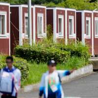 Officials defend using temporary containers, cruise ship as lodging at Asian Games