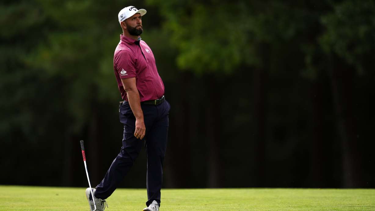 Jon Rahm of Spain drops his club on the 13th hole during the first round of the BMW Championship golf tournament in Virginia Water, England, Thursday Sept. 17, 2026.