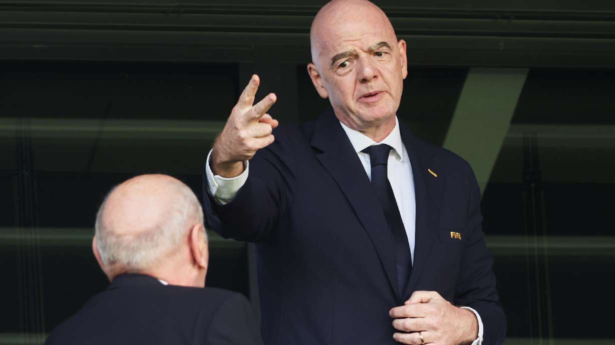 FIFA President Gianni Infantino gestures as he attends the Women's U20 World Cup opening match between Poland and Argentina in Katowice, Poland, Saturday, Sept. 5, 2026.