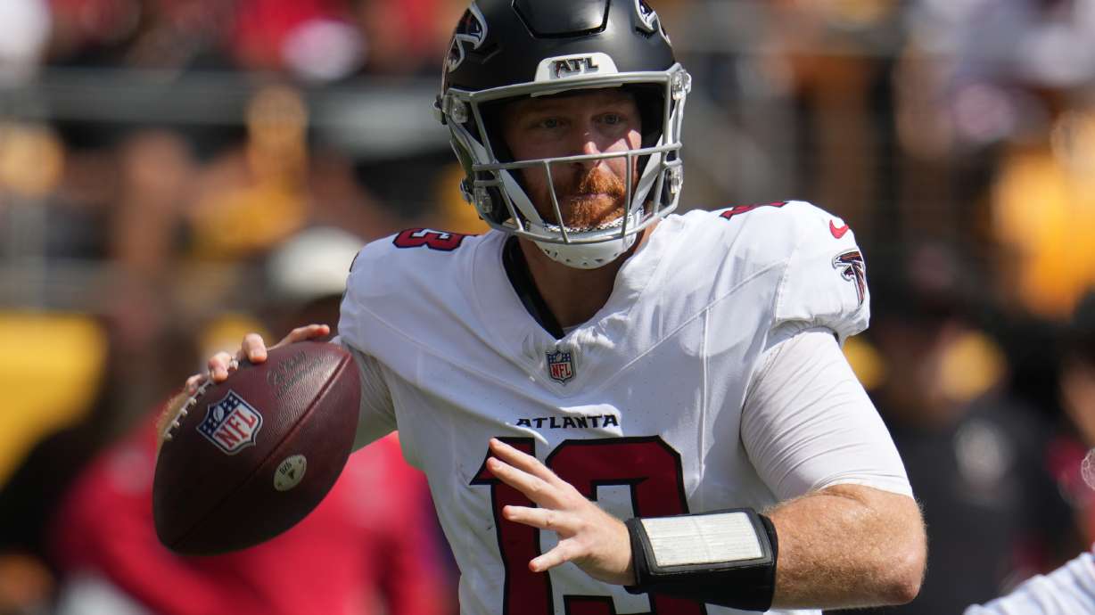 Atlanta Falcons quarterback Cooper Rush (13) looks to pass the ball during an NFL football game against the against the Pittsburgh Steelers, Sunday, Sept. 13, 2026, in Pittsburgh.