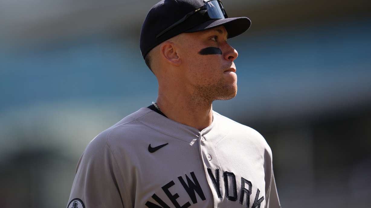 New York Yankees' Aaron Judge walks back to the dugout after the bottom of the fourth inning of a baseball game against the Minnesota Twins, Wednesday, Sept. 16, 2026, in Minneapolis.
