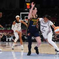 Fever's Mitchell surprised by postgame party after setting WNBA scoring record in win at Toronto