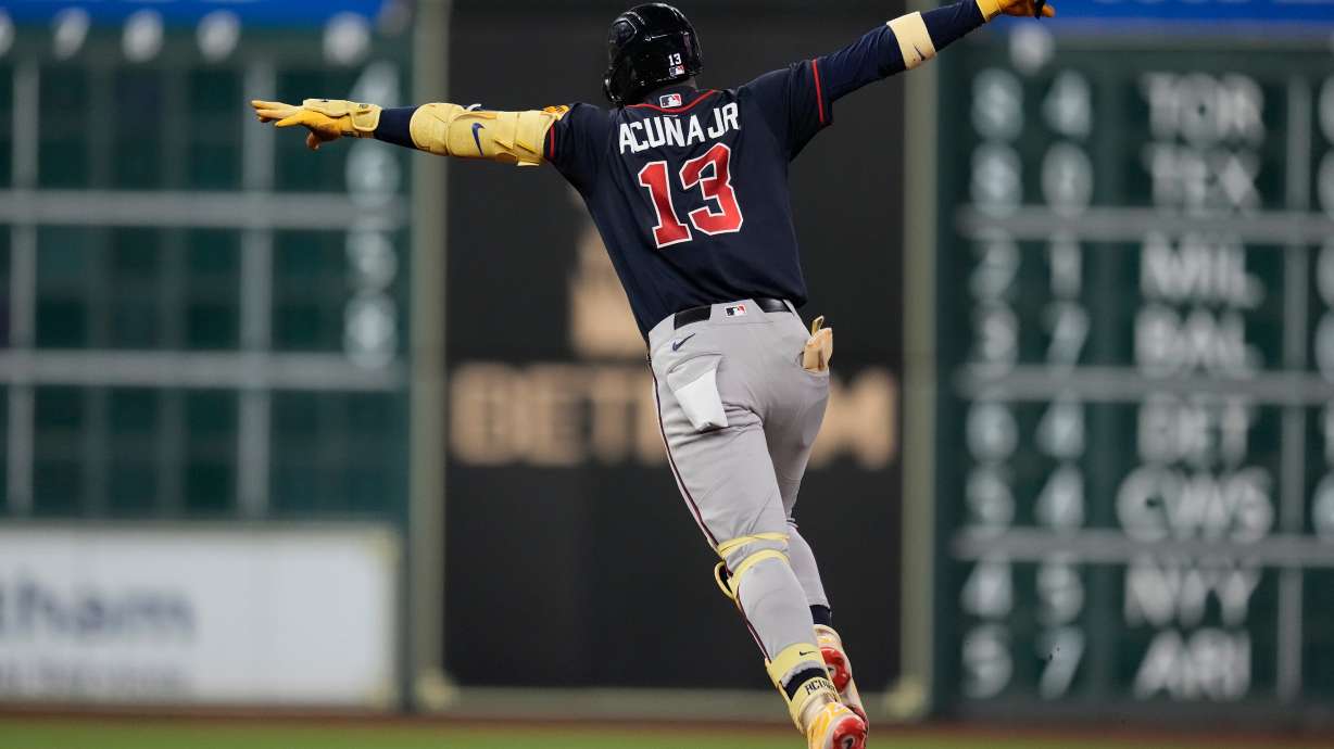 Atlanta Braves' Ronald Acuña Jr. celebrates after hitting a home run during the seventh inning of a baseball game against the Houston Astros in Houston, Friday, Sept. 18, 2026.