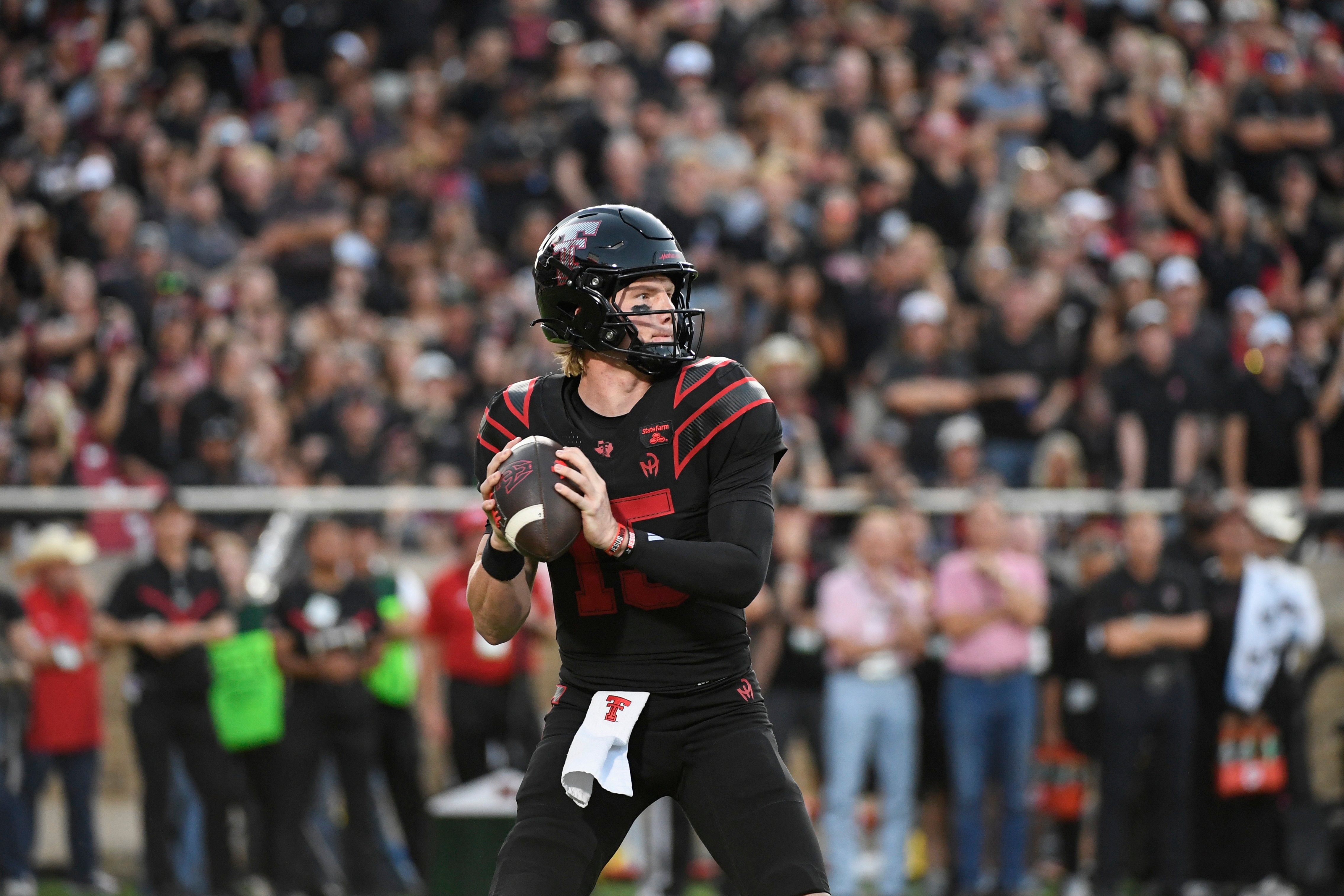 Texas Tech quarterback Will Hammond drops back to throw the ball against Houston during the first half of an NCAA college football game Friday, Sept. 18, 2026, in Lubbock, Texas. 