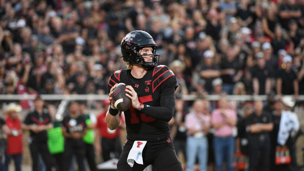 Texas Tech quarterback Will Hammond drops back to throw the ball against Houston during the first half of an NCAA college football game Friday, Sept. 18, 2026, in Lubbock, Texas.
