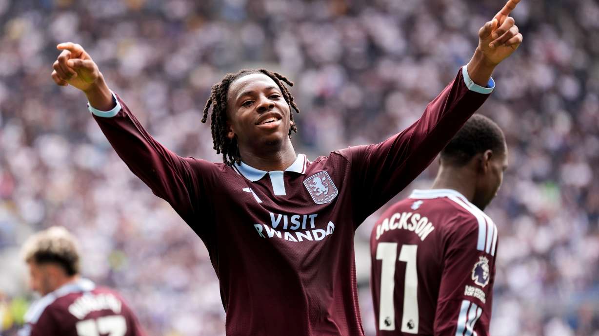 Aston Villa's Johan Manzambi celebrates as he scores the opening goal during the English Premier League soccer match between Tottenham Hotspur and Aston Villa, at Tottenham Hotspur Stadium in London, Saturday, Sept. 19, 2026.