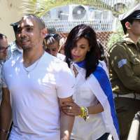 Israel's president pardons a combat medic whose shooting of a Palestinian attacker caused debate