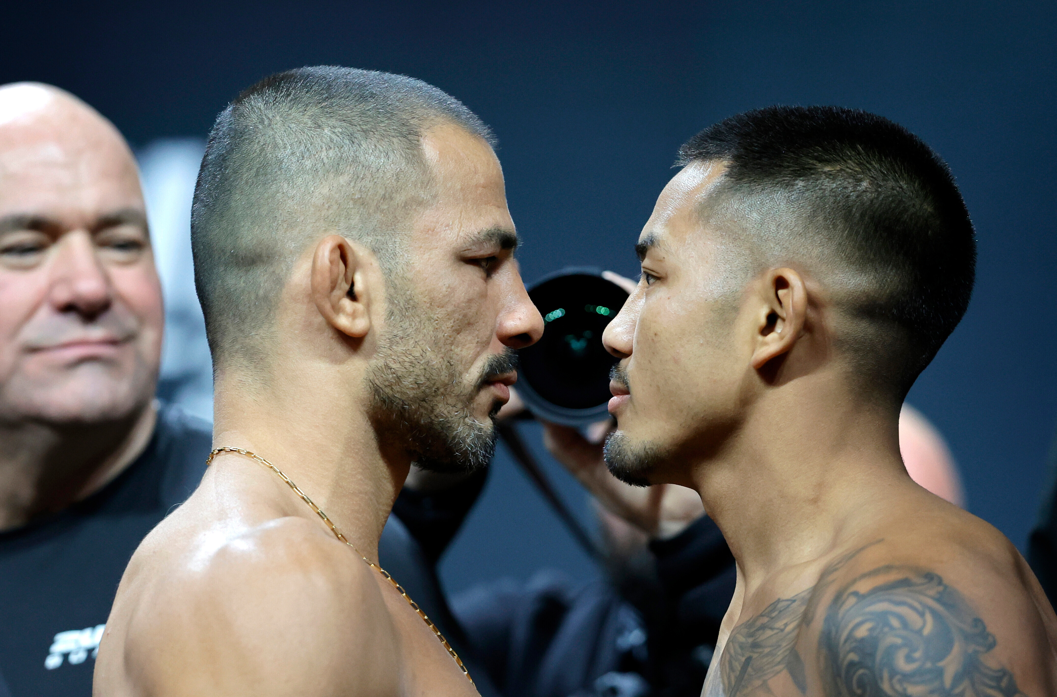 FILE - UFC flyweight champion Alexandre Pantoja, left, of Brazil, and Joshua Van, originally of Myanmar, face off during a ceremonial weigh-in for UFC 323 Friday, Dec. 5, 2025, in Las Vegas 