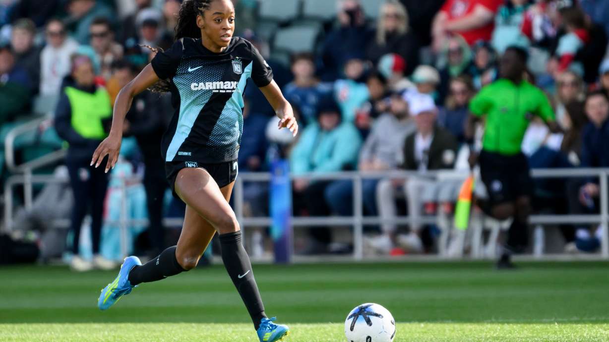 FILE- Gotham FC forward Jordynn Dudley brings the ball upfield against the Kansas City Current during an NWSL soccer match, April 4, 2026, in Kansas City, Mo.