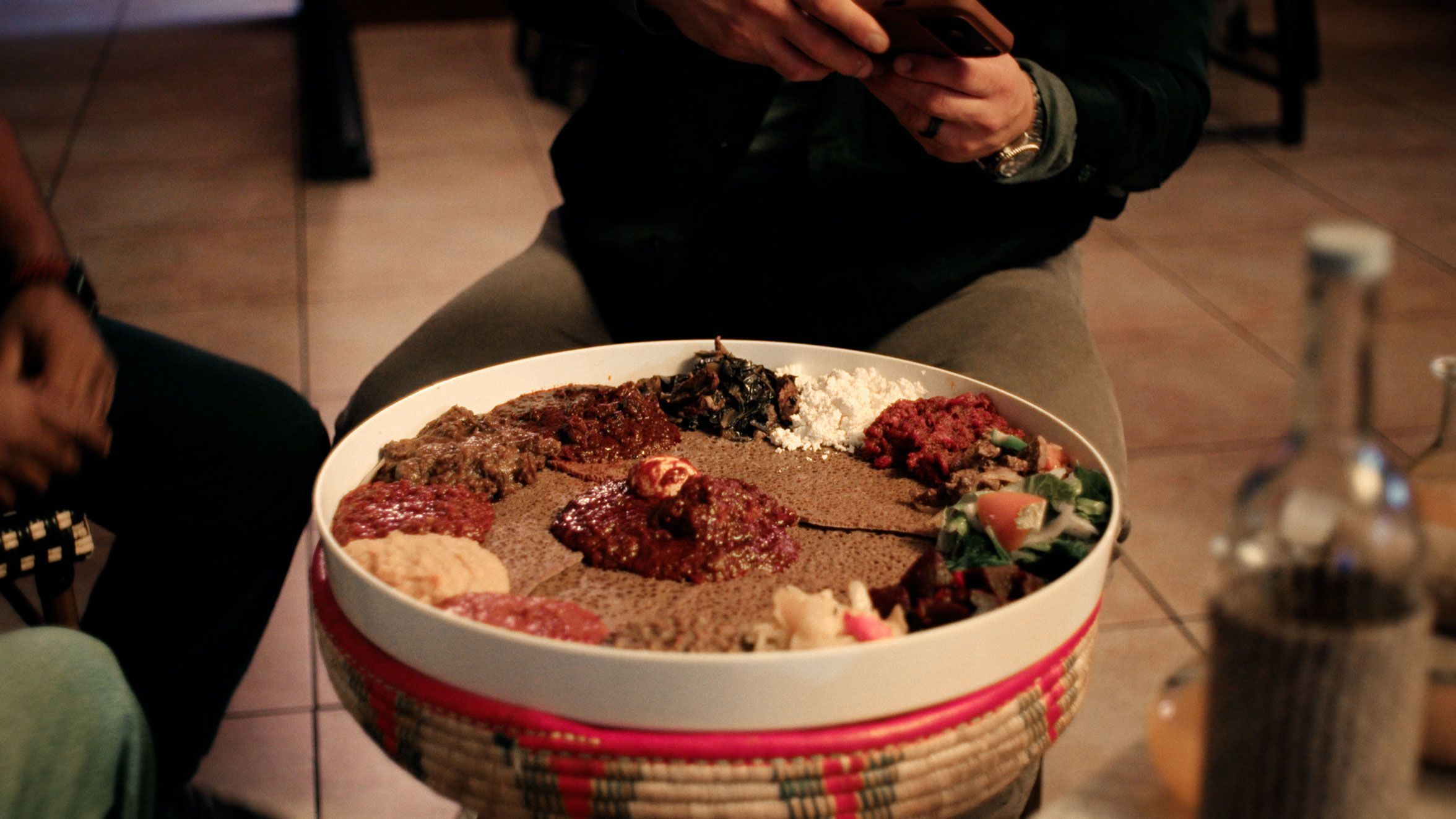 In Las Vegas, the travelers tuck into a platter of food at Lucy Ethiopian Restaurant.