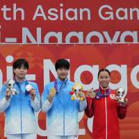 Chinese 13-year-old Yu Zidi starts quickly in the pool at the Asian Games