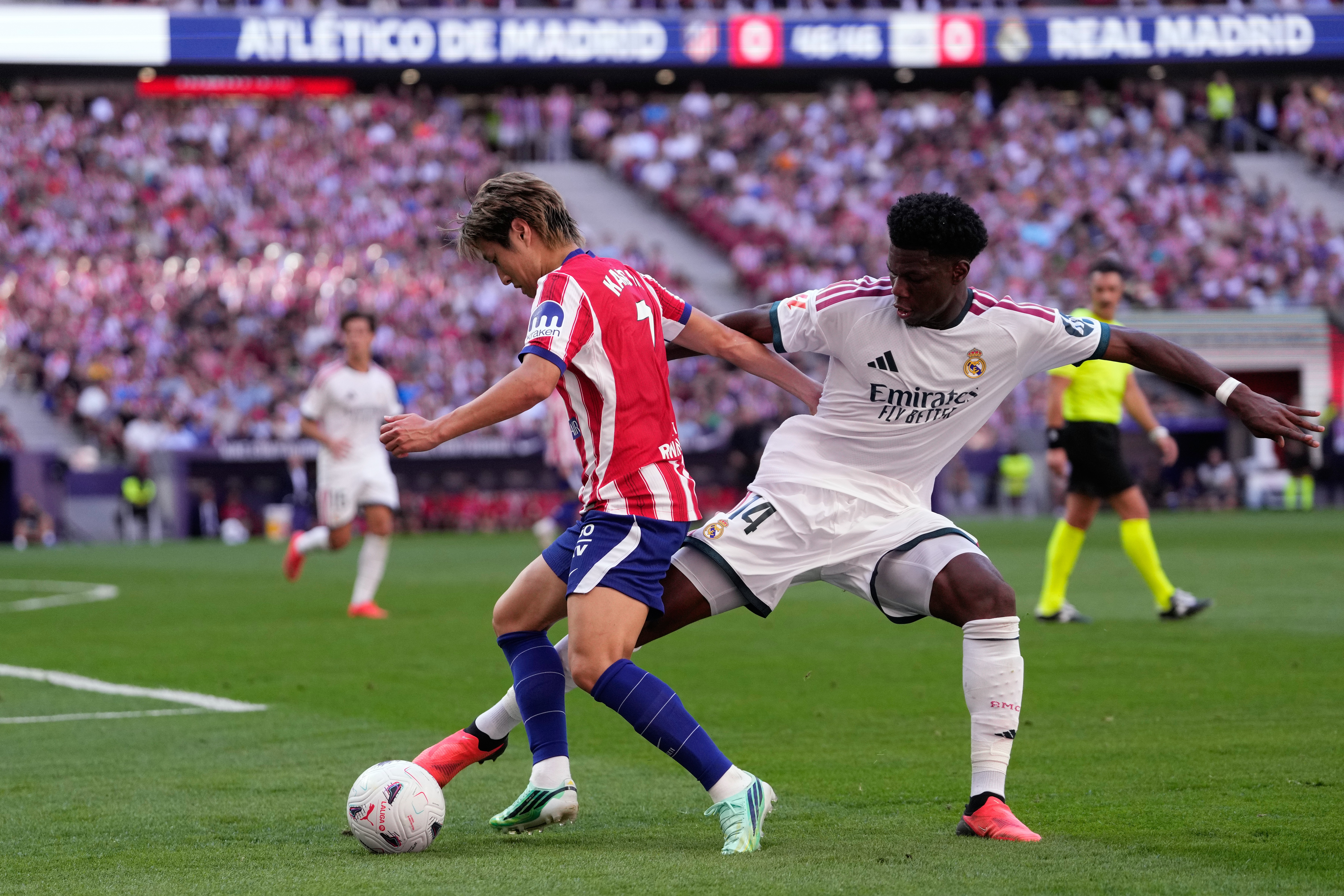 Atletico Madrid beats 10-man Real Madrid 2-1 in derby, Man City outlasts Sunderland in England