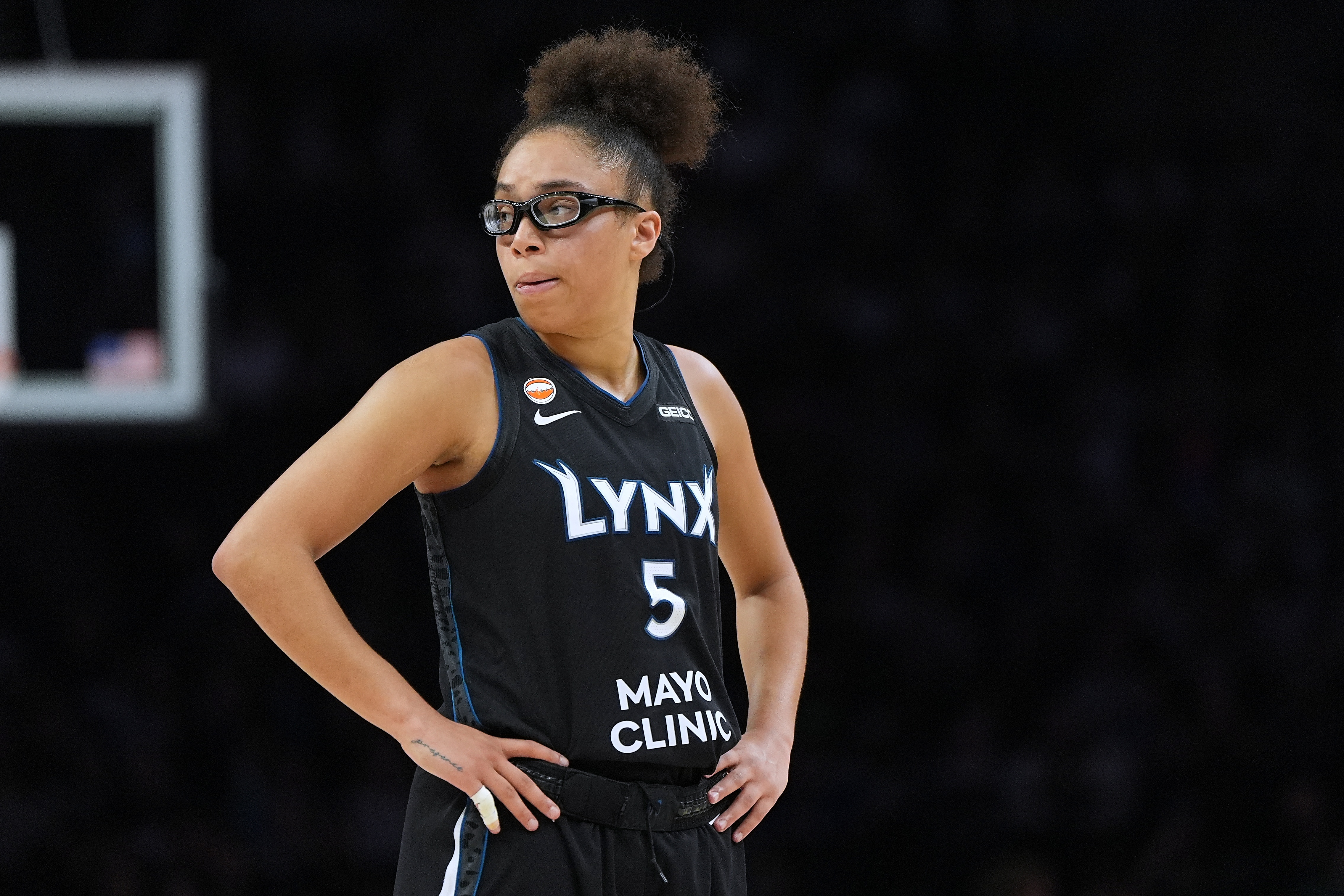 Minnesota Lynx guard Olivia Miles stands on the court during the second half of a WNBA basketball game against the New York Liberty, Friday, Sept. 18, 2026, in Minneapolis. 