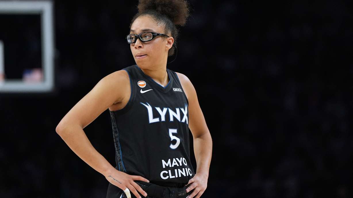 Minnesota Lynx guard Olivia Miles stands on the court during the second half of a WNBA basketball game against the New York Liberty, Friday, Sept. 18, 2026, in Minneapolis.