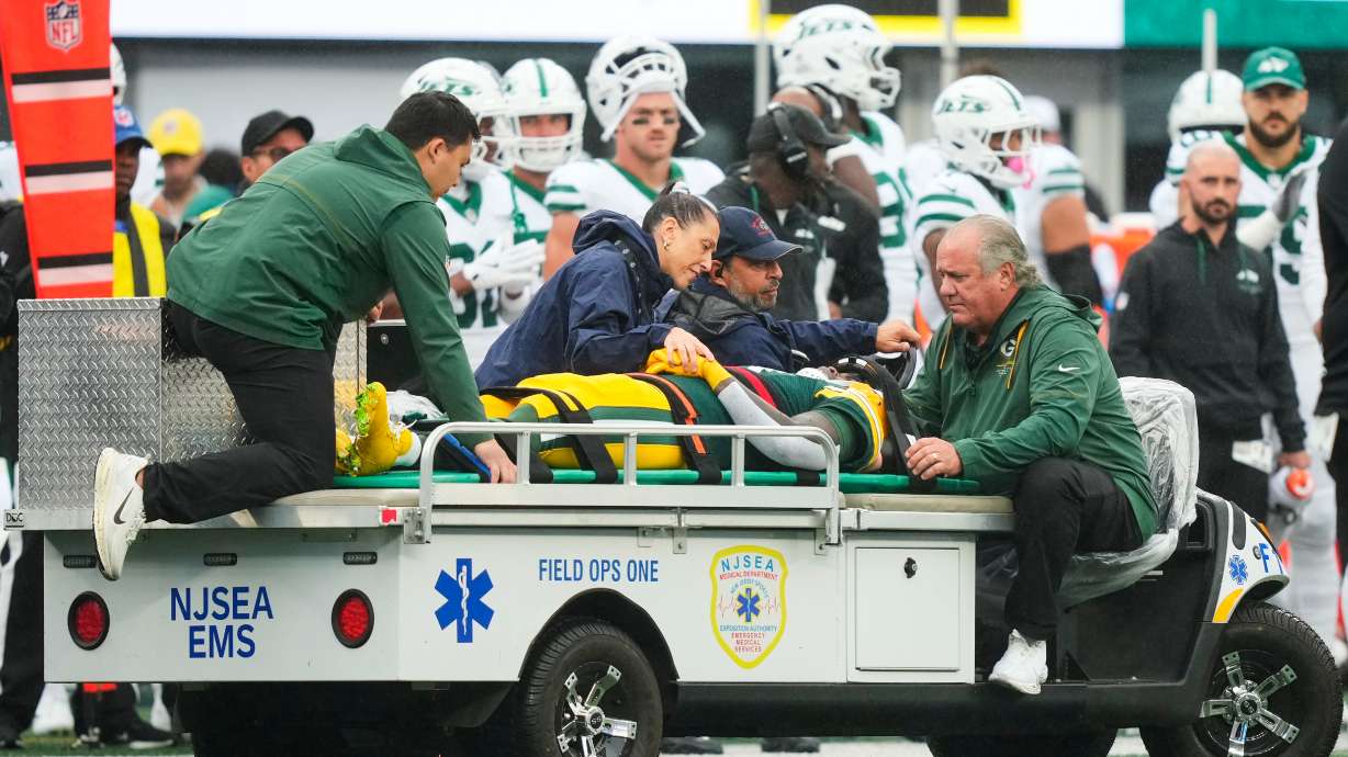 Green Bay Packers wide receiver Jayden Reed (11) is taken off the field following an injury during an NFL football game againt the New York Jets in East Rutherford, N.J., Sunday, Sept. 20, 2026.