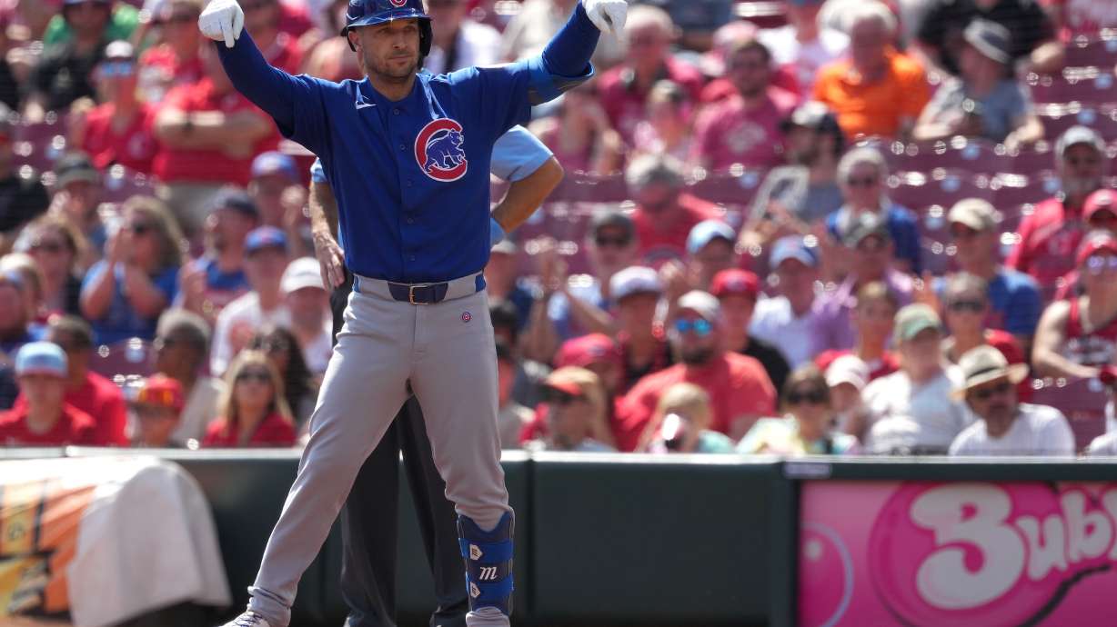 Chicago Cubs' Alex Bregman celebrates after a one-run single during the first inning of a baseball game against the Cincinnati Reds, Sunday, Sept. 20, 2026, in Cincinnati.