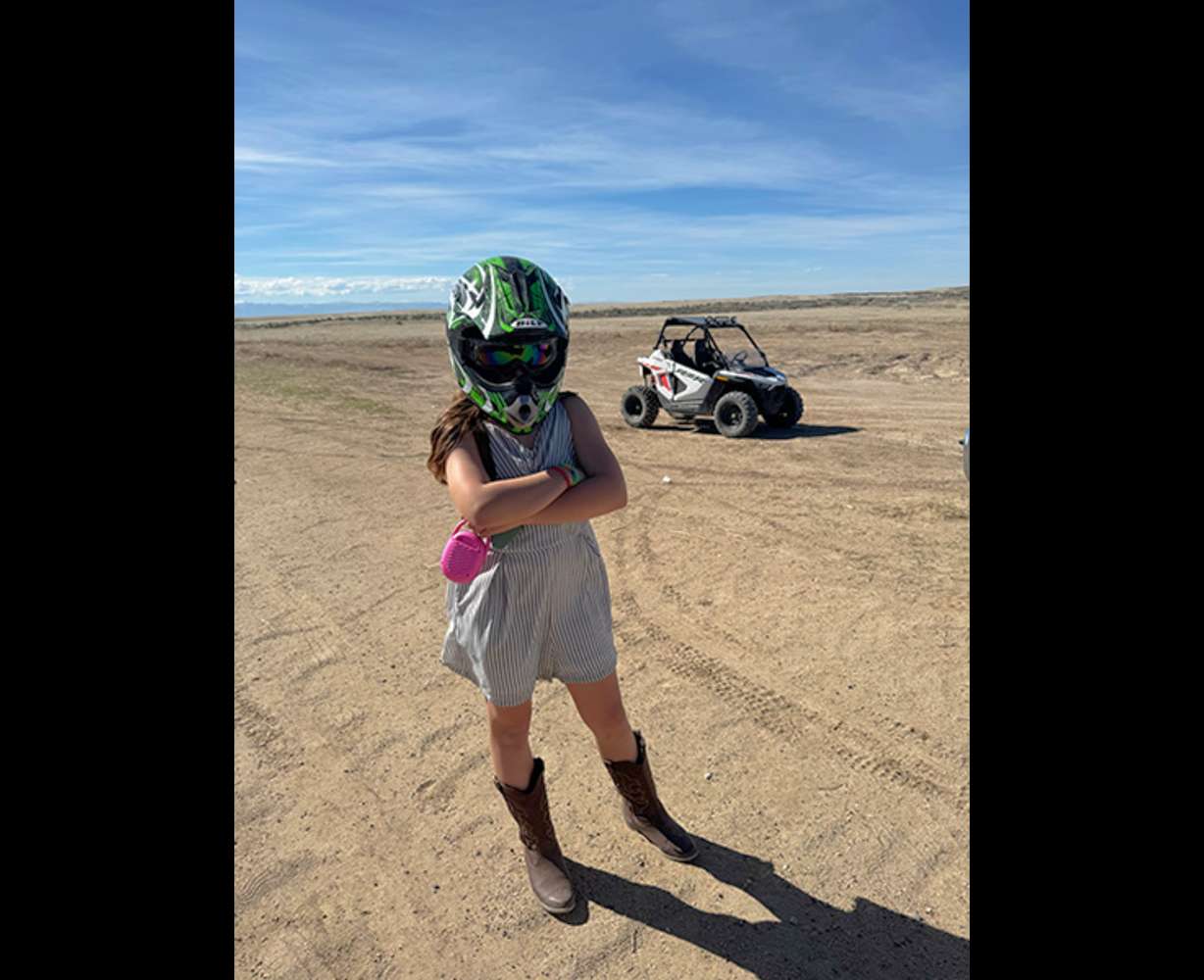 In this undated image, Chloe Hanish is geared up, ready to drive her RZR 200.