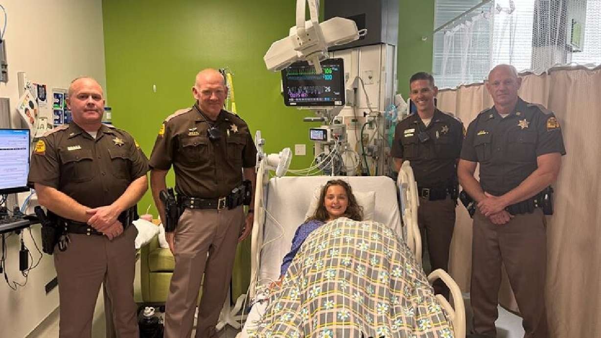 Chloe Hanish at the hospital with her dad, Chase Hanish, and his Idaho State Police co-workers. If you’re looking for an example of perseverance, look no further than 12-year-old Chloe Hanish.