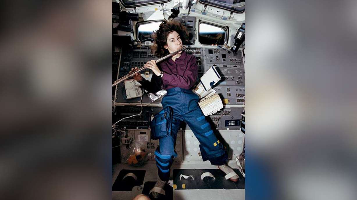 Ellen Ochoa, STS-56 mission specialist, takes a brief time out from a busy day in space to play a 15-minute set of flute music on the space shuttle Discovery’s aft flight deck. Ochoa, who has played the flute for years, performed the Marine Corps Hymn, Navy Hymn and God Save the Queen for fellow crew members, as well as some Vivaldi for herself. Ellen Ochoa was one of five people aboard the space shuttle Discovery when it launched on April 8, 1993. The mission was the first of four that earned her a place in history as the first Hispanic woman in space.